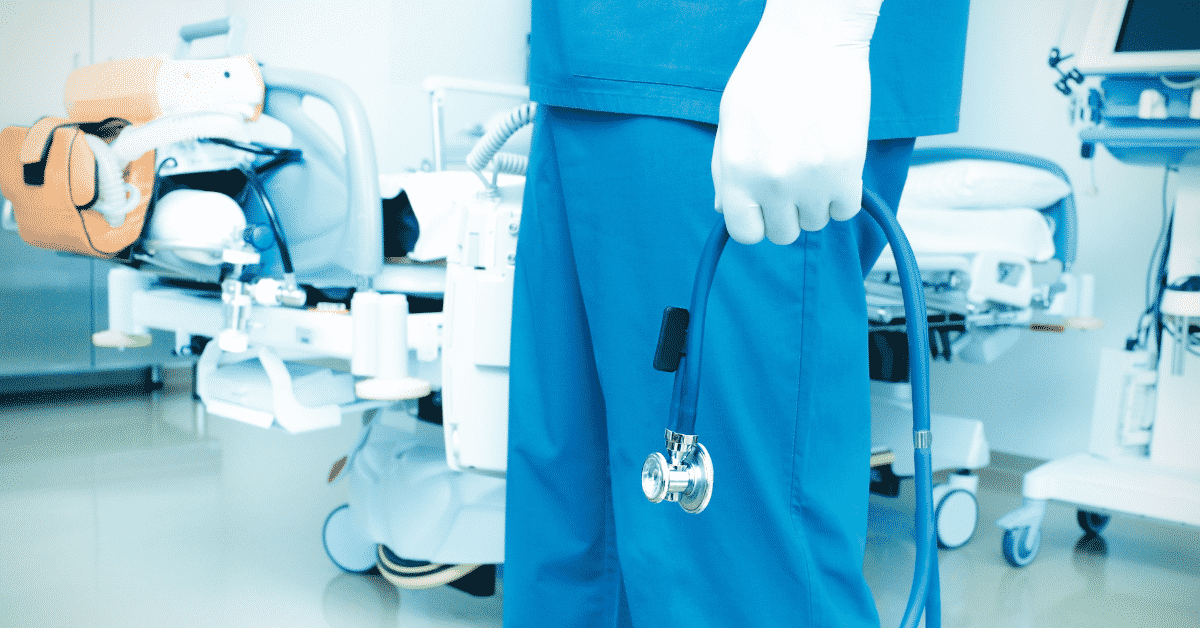 Doctor holding his equipment on operation room